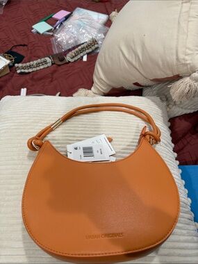 NWT Urban Originals Peach Crescent Shoulder Bag